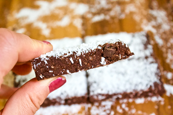 Chocolate Banana Coconut Fudge Bars | Chocolate, banana, and coconut come together in these deliciously decadent fudge bars. These no-bake treats are easy to make, naturally vegan, gluten-free, and have no added sugar. A perfect dessert or healthy, sweet snack!