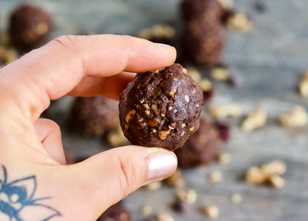 Chocolate Cherry Mocha Brownie Bites | Rich cocoa and sweet cherries combine in these raw, vegan brownie bites! Amazing chocolate flavor is complimented with a hint of coffee and lots of crunch from raw almonds and walnuts. These bites taste decadent, but are actually healthy and full of plant-based protein. The ultimate no-bake brownie treat!