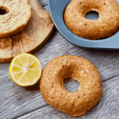 Lemon Meringue Donuts | Luscious lemon donuts that are deliciously sweet and ever so subtly tart! Fresh, fruity, and full of protein, these easy to make, gluten-free donuts make the perfect summer snack. 