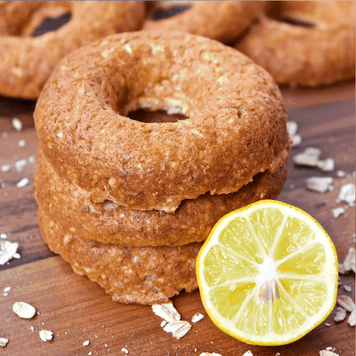 Lemon Meringue Donuts | Luscious lemon donuts that are deliciously sweet and ever so subtly tart! Fresh, fruity, and full of protein, these easy to make, gluten-free donuts make the perfect summer snack. 