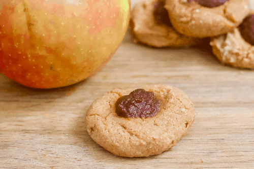 Apple Pie Thumbprint Cookies | Soft, doughy thumbprint cookies with a heavenly apple cinnamon scent and taste! Vegan, gluten-free, and only sweetened with fruit. These cookies are like bite-sized apple pies! 