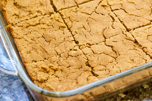 3-Ingredient Peanut Butter Blondies | It only takes 3 simple, every day ingredients to create these lusciously fudgy peanut butter blondies! Dense and delicious, biting into one of these bars will transport you to peanut butter heaven. Vegan, grain-free, and easy to make!