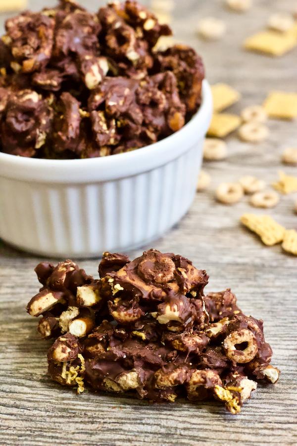Not-So-Trashy Candy. | A healthy twist on a classic holiday candy treat! White Trash Candy gets a healthy makeover in my version of Not-So-Trashy Candy. Dark chocolate, unsweetened dried fruits, whole grain cereals, and other superfoods make the perfect mix of sweet n' salty flavor while being better for you than the original! This is a holiday snack you can feel good about making AND eating.