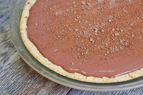 Low-Fat Vegan Chocolate Pudding Pie | Your pie dreams have come true with this healthy Chocolate Pudding Pie recipe! Creamy, delicious chocolate pudding finds a home within a gluten-free, vegan, naturally-sweetened crust. The heavenly mix of textures and rich taste will have you smiling all the way through your slice (or two!)!