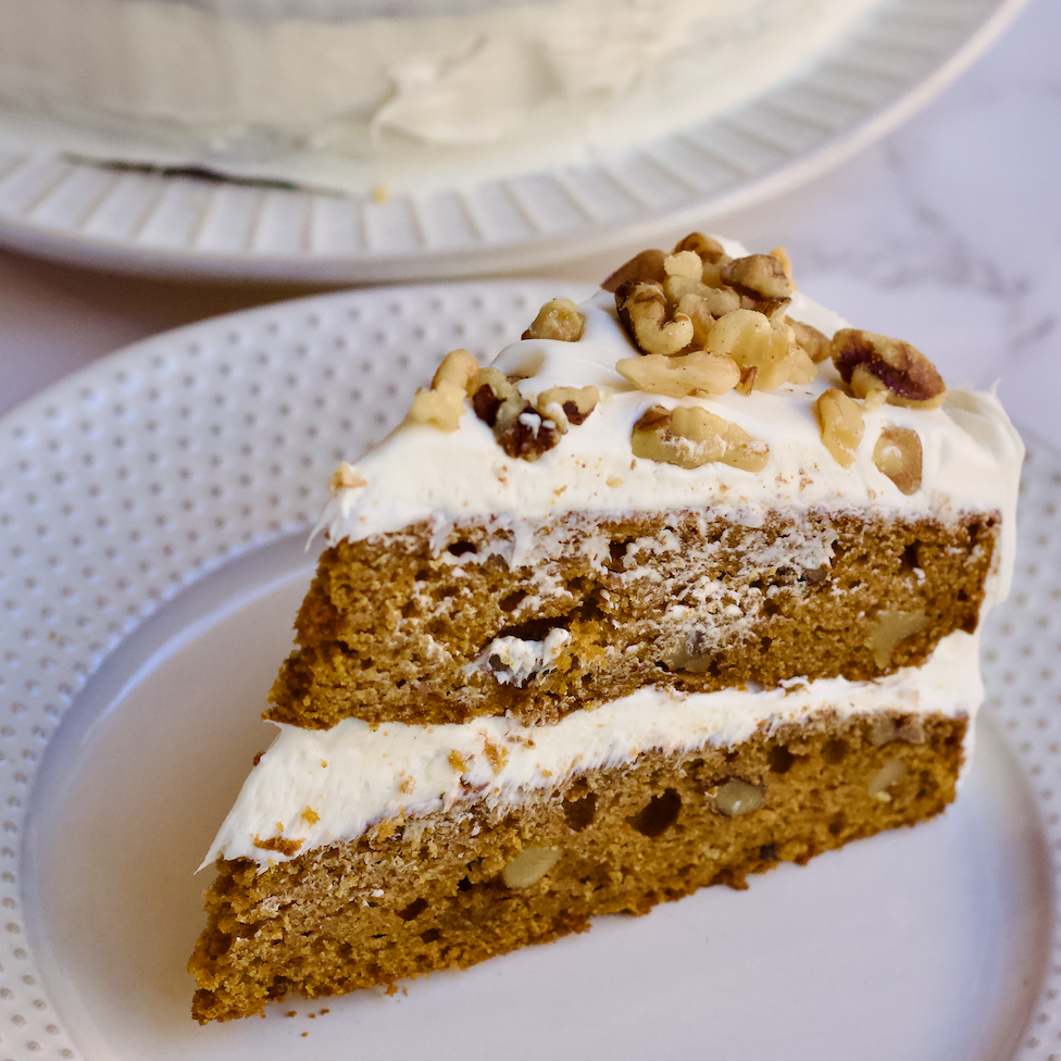 Delicious dairy-free gluten-free Pumpkin Spice Cake studded with rich walnuts and topped with decadent cream cheese frosting! A lighter, healthier option for homemade dessert during the holidays. This easy-to-make, from-scratch cake is a family favorite and a guaranteed crowd-pleaser. Made with whole grains and REAL food ingredients!