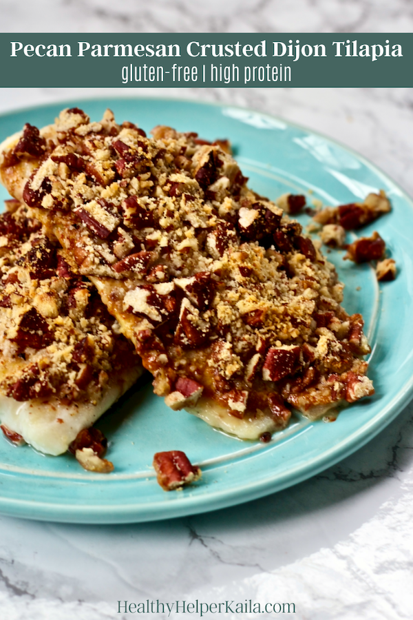 Pecan Parmesan Crusted Dijon Tilapia | Crunchy pecans combine with savory cheese to create a delicious topping for flavorful tilapia fillets! This main dish is perfect for a quick, healthy weeknight meal and will impress even non-seafood lovers.