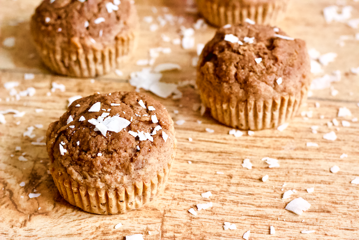 Coconut Gingerbread Protein Muffins | Soft and fluffy gingerbread muffins with the sweet flavor of coconut! Gluten-free, high protein, and no added sugar...these muffins are perfect for enjoying year round.
