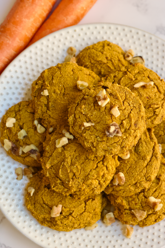 Carrot cake in muffin top form! Vegan, gluten-free, and no added sugar. These little treats are sweetened only with Medjool dates and are perfect for a healthy breakfast or snack on the go!