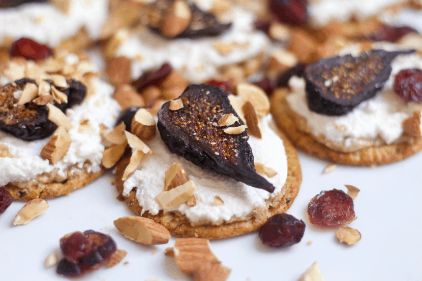 Creamy Almond and Fig Crackers Stacks | Healthy Helper @Healthy_Helper A creamy, crunchy appetizer that everyone will love! Layered with rich almond butter, mild ricotta cheese, and sweet figs these cracker stacks are everything you could want in a snack. High in protein, low in fat, full of whole grain fiber, and perfect for sharing with others!