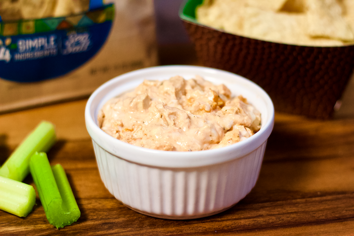 Vegan Buffalo Chicken Wing Dip | All the flavor of your favorite BIG GAME snack staple without any animal products! Creamy, cheesy, and so crave-worthy. This rich-tasting appetizer is the perfect easy recipe for sharing with friends and family while rooting your favorite team to victory!