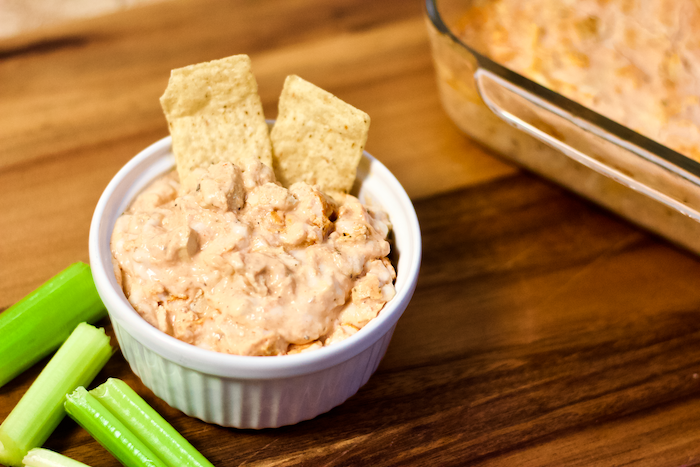 Vegan Buffalo Chicken Wing Dip | All the flavor of your favorite BIG GAME snack staple without any animal products! Creamy, cheesy, and so crave-worthy. This rich-tasting appetizer is the perfect easy recipe for sharing with friends and family while rooting your favorite team to victory!