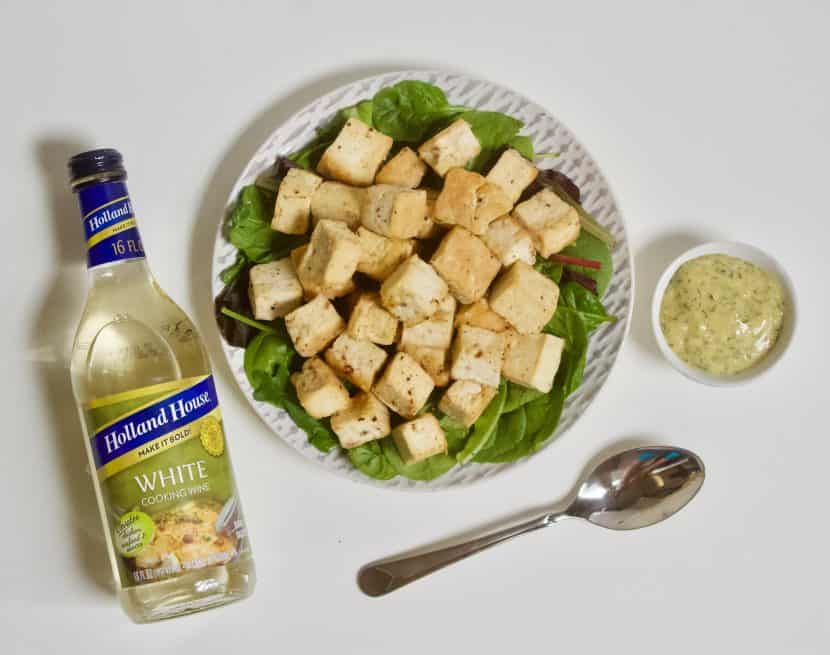 Baked Tofu with White Wine, Dill, & Mustard Sauce | Healthy Helper Perfectly baked tofu pairs creamy, tangy sauce for a delicious plant-based main dish! A great addition to a holiday menu or to make for an easy meatless weeknight meal. Vegan, gluten-free, low in fat and carbs, and SO flavorful. This will be your new favorite way to prepare tofu!