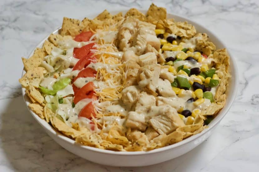 Quick n' Easy Southwestern Chicken Cobb Salad | A lightened-up version of a traditional chicken Cobb salad with a Southwestern twist! Made with fresh veggies, grilled chicken, beans, low-fat cheese, and yogurt-based ranch dressing. A perfectly balanced meal with tons of flavor and healthy ingredients!