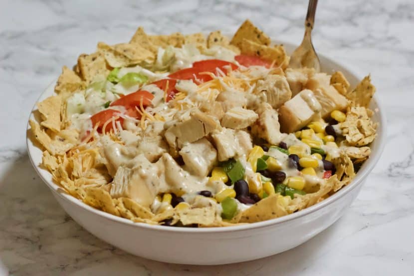Quick n' Easy Southwestern Chicken Cobb Salad | A lightened-up version of a traditional chicken Cobb salad with a Southwestern twist! Made with fresh veggies, grilled chicken, beans, low-fat cheese, and yogurt-based ranch dressing. A perfectly balanced meal with tons of flavor and healthy ingredients!