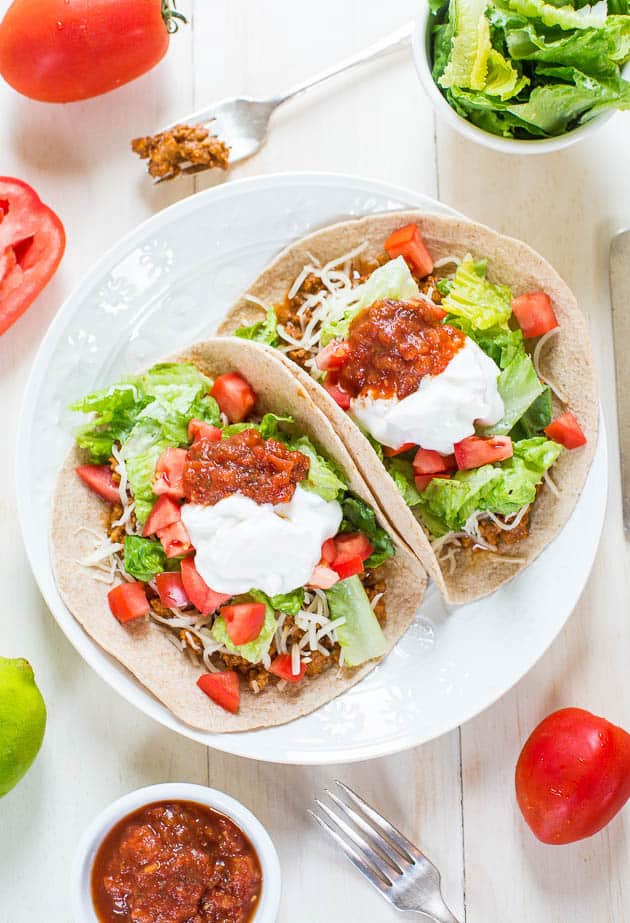 17 Healthy Taco Recipes | A roundup of 17 healthy, delicious taco recipes to enjoy on National Taco Day...or any day! Vegan, vegetarian, and meaty recipes for everyone.