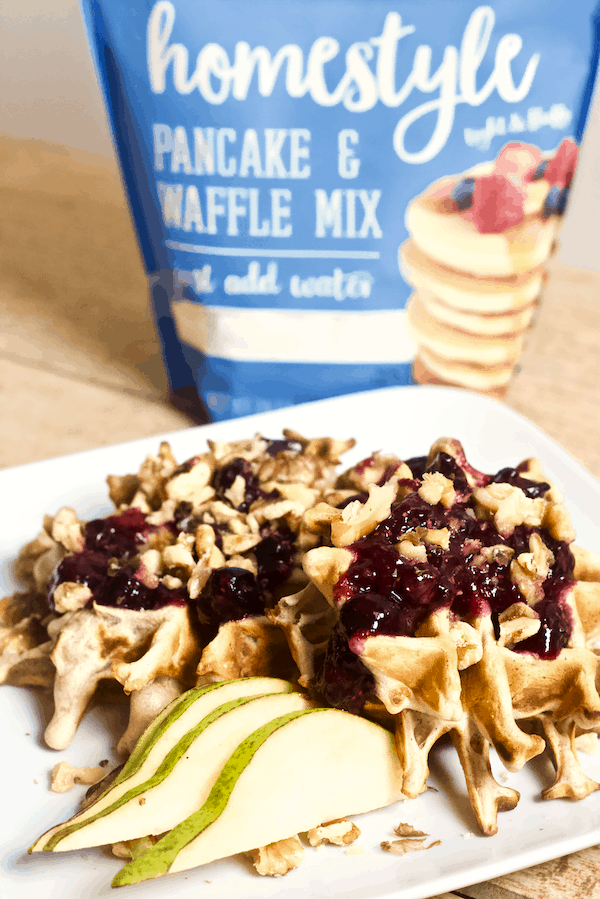  Cinnamon Pear Waffles with Homemade Blueberry Syrup | Cinnamon pear waffles with homemade blueberry syrup and walnuts. This sweet waffle recipe will surely become your new favorite breakfast!