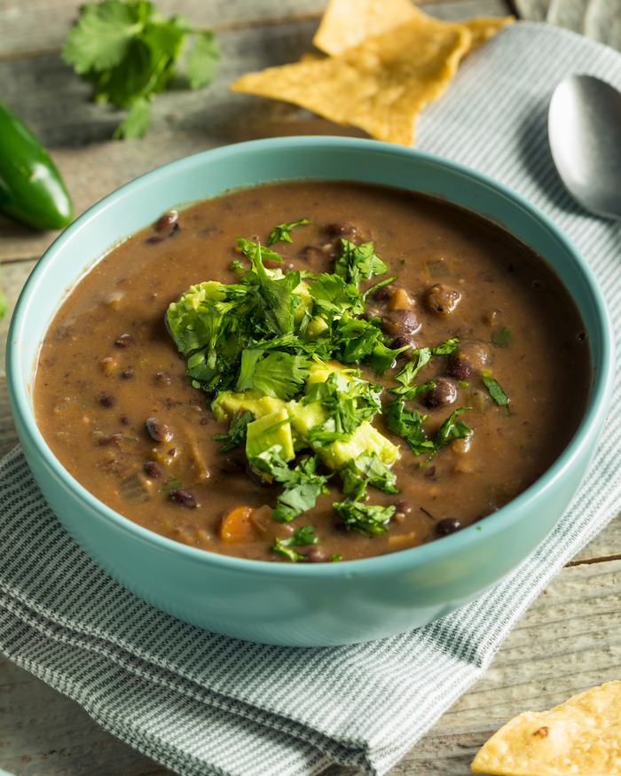 Easy Vegan Instant Pot Black Bean Soup | Easy, healthy black bean soup made in the Instant Pot! Vegan, gluten-free, full of fiber, and high protein. A great option for meal prep for a healthy lunch all week long.