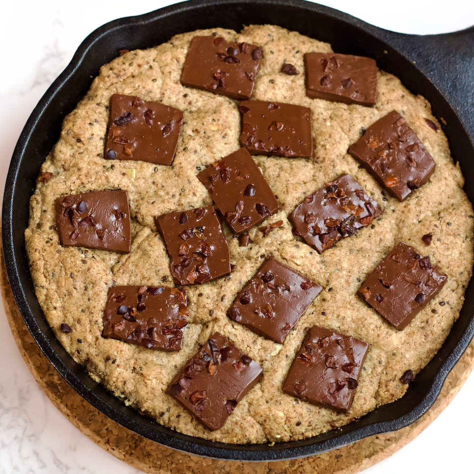 This decadent, soft-baked Chocolate Chunk Skillet Cookie is vegan, grain-free, and no added sugar. Totally delicious and guilt-free!