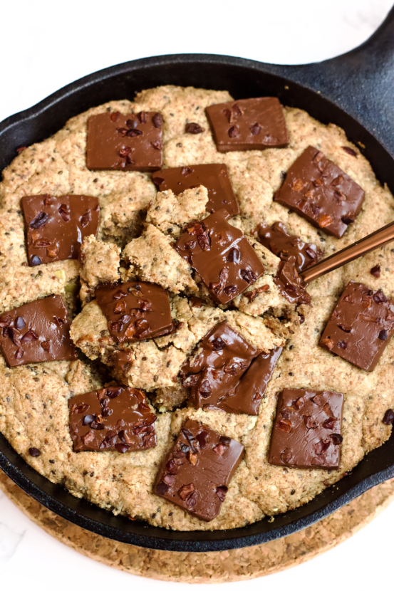 This decadent, soft-baked Chocolate Chunk Skillet Cookie is vegan, grain-free, and no added sugar. Totally delicious and guilt-free!